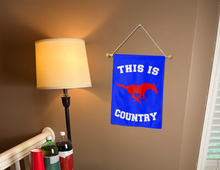 Load image into Gallery viewer, this is smu country garden flag hung inside a college dorm for decoration