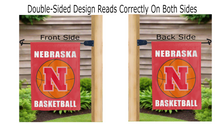 Load image into Gallery viewer, nebraska basketball logo reading correctly on both sides of red double sided garden flag