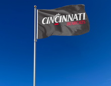 Load image into Gallery viewer, outdoor display of black university of cincinnati bearcats flag for tailgate decor