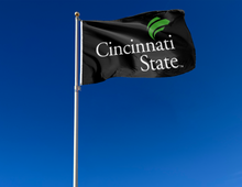 Load image into Gallery viewer, outdoor display of black cincinnati technical and community college flag for tailgate decor
