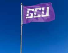 Load image into Gallery viewer, outdoor display of purple gcu lopers flag for tailgate decor