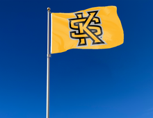 Load image into Gallery viewer, outdoor display of gold kennesaw state university flag for tailgate decor