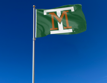 Load image into Gallery viewer, outdoor display of green montana tech flag with mt interlock logo for tailgate decor