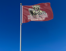 Load image into Gallery viewer, outdoor display of maroon kutztown university golden bears flag for tailgate decor