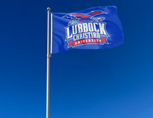 Load image into Gallery viewer, outdoor display of blue lubbock christian university flag for tailgate decor