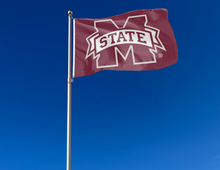 Load image into Gallery viewer, outdoor display of mississippi state university 3x5 flag for tailgate decor
