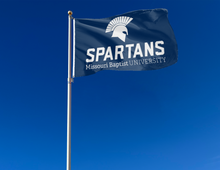 Load image into Gallery viewer, outdoor display of blue missouri baptist university spartans flag for tailgate decor