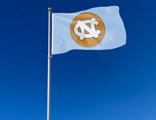 Load image into Gallery viewer, outdoor display of blue north carolina basketball flag for tailgate decor