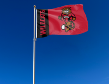 Load image into Gallery viewer, outdoor display of red and black ndscs wildcats flag for tailgate decor