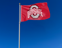 Load image into Gallery viewer, outdoor display of red ohio state university buckeyes flag for tailgate decor