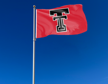 Load image into Gallery viewer, outdoor display of red texas tech university red raiders flag for tailgate decor