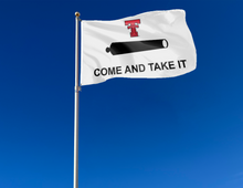 Load image into Gallery viewer, outdoor display of texas tech university flag with come and take it logo for taiilgate decor
