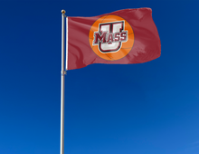 Load image into Gallery viewer, outdoor display of maroon umass minutemen basketball flag for tailgate decor