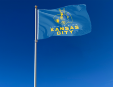 Load image into Gallery viewer, outdoor display of university of missouri kansas city flag for tailgate decor