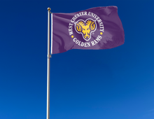 Load image into Gallery viewer, outdoor display of purple west chester university golden rams flag for tailgate decor
