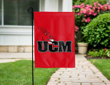 Load image into Gallery viewer, red double sided garden flag with ucm logo hung outside for yard decor