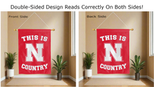 Load image into Gallery viewer, this is nebraska huskers country logo reading correctly on both sides of red double sided house flag