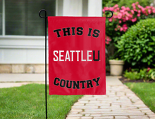 Load image into Gallery viewer, this is seattle university garden flag hung outside the home for yard decor