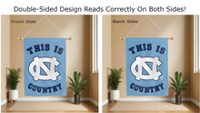 Load image into Gallery viewer, this is unc tar heels country logo reading correctly on both sides of blue double sided house flag