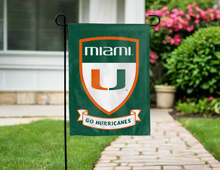 Load image into Gallery viewer, green university of miami garden flag with shield and go hurricanes logos for yard decor