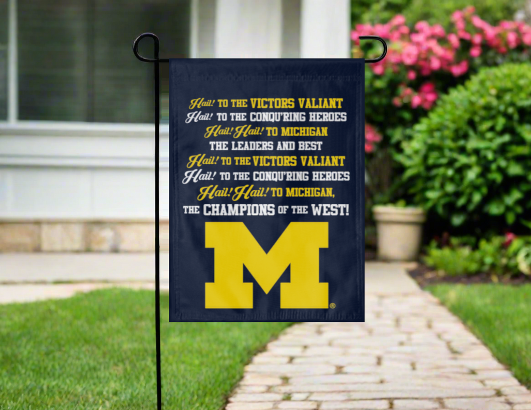blue michigan wolverines fight song garden flag hung on a garden flag stand outside