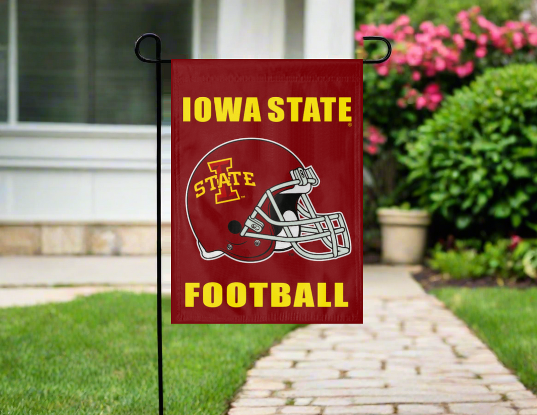 Iowa State football garden flag on a pole in front of a house with a pathway and flowers.