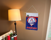 Load image into Gallery viewer, double sided arizona baseball cws 2025 garden flag hanging on banner pole next to a lamp and drinks
