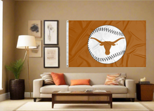 Load image into Gallery viewer, Orange University of Texas Baseball Flag with two metal grommets covering tan wall of well lit room
