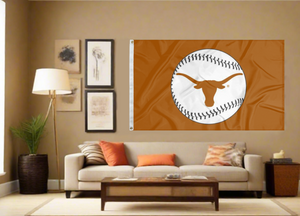 Orange University of Texas Baseball Flag with two metal grommets covering tan wall of well lit room