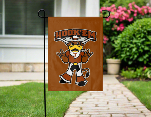 orange Texas university garden flag with hook em logo hanging outside on a garden flag stand
