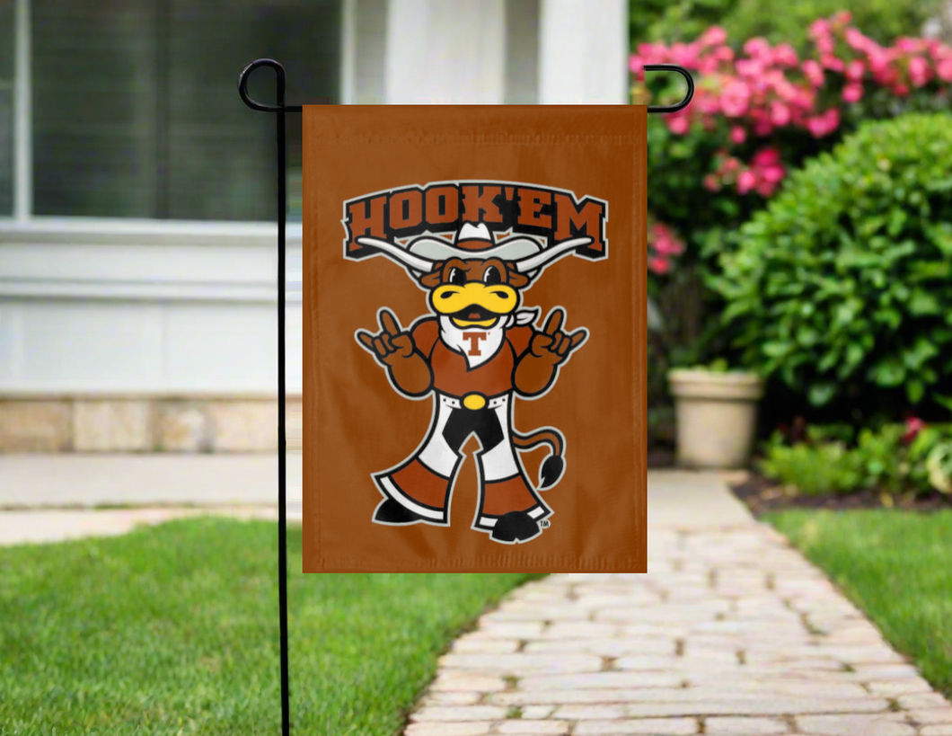 orange Texas university garden flag with hook em logo hanging outside on a garden flag stand