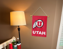 Load image into Gallery viewer, red university of utah garden flag hanging on banner pole inside living room
