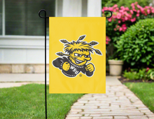 Load image into Gallery viewer, gold wichita state garden flag hung outside from garden flag stand
