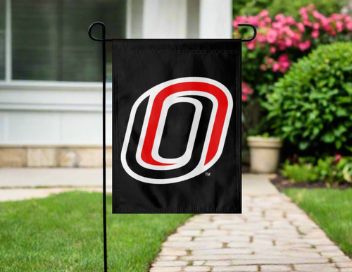 black uno garden flag hung outside from garden flag stand