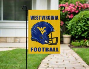west virginia football garden flag hanging on a garden flag stand outside