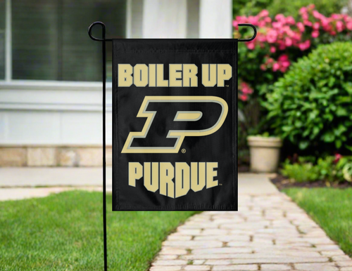 purdue garden flag with boiler up logo hanging outside on a garden flag stand