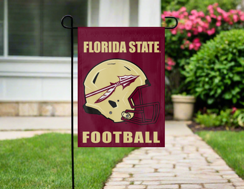 fsu football garden flag hung on a garden flag stand outside the home