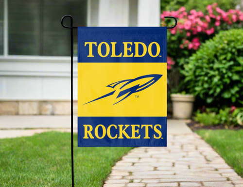 toledo university garden flag hung outside from garden flag stand
