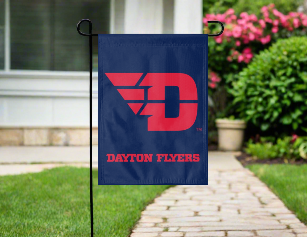 blue dayton university garden flag hung outside from garden flag stand