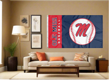 Load image into Gallery viewer, Blue and red 3x5 Ole Miss Baseball Flag with two metal grommets covering tan wall of well lit room
