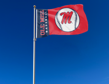 Load image into Gallery viewer, two panel blue and red Ole Miss Baseball Flag with two metal grommets attached to flagpole waving in the wind
