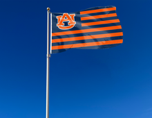 Load image into Gallery viewer, Blue and Orange stripes 3x5 foot wide USA Flag Style Auburn University Flag with two metal grommets attached to flagpole waving in the wind
