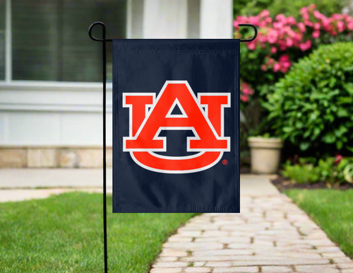 blue auburn university garden flag hung outside from garden flag stand