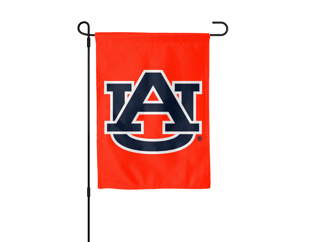 orange Auburn University garden flag hanging on black garden flag stand
