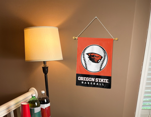 Oregon State Baseball Garden flag hanging on banner pole inside living room