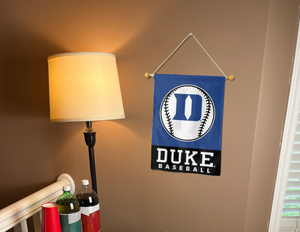 duke baseball garden flag hanging on banner pole inside living room