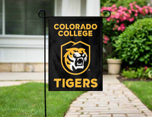 Load image into Gallery viewer, black colorado college garden flag hung outside from garden flag stand
