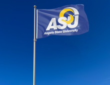 Load image into Gallery viewer, Blue 3x5 Foot wide Angelo State University Flag with Two metal grommets attached to a flagpole as it waves in the wind
