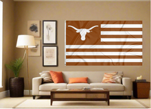 Load image into Gallery viewer, University of Texas National Flag with seven burnt orange stripes six white stripes two metal grommets covering tan wall of well lit room

