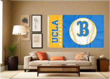 Load image into Gallery viewer, Blue and Gold 3x5 UCLA Baseball Flag with two metal grommets covering tan wall of well lit room
